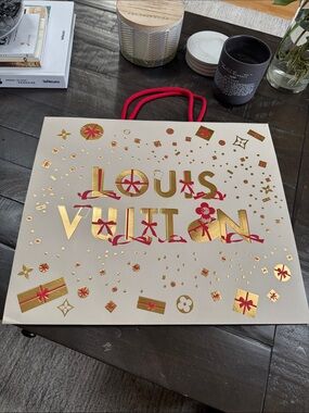 Louis Vuitton Holiday Cream Gift Bag with Gold Foil and Red Accents